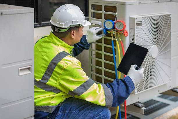 Professional Hvac technician working in Bellevue, OH
